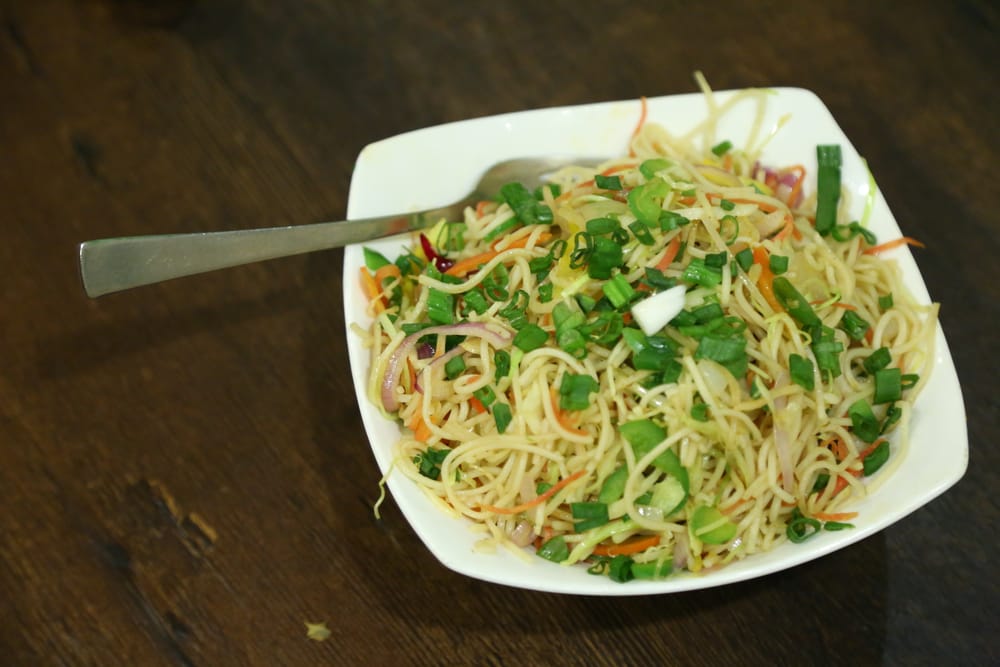 Hakka noodles tossed with julienned vegetables